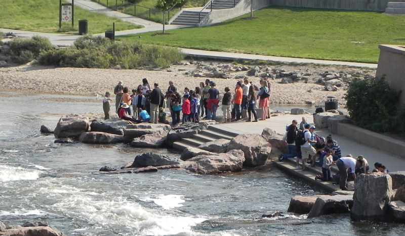 Students gather at Confluence Park to test the South Platte River for Denver's 2012 World Water Monitoring Day event. Photo courtesy of Darcy Campbell, U.S. Environmental Protection Agency.