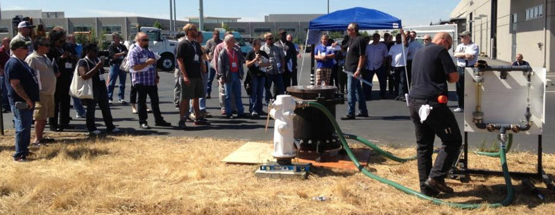 The tour Know Your Flow — Saving Big $$$ and Making Your Regulator Happy included a demonstration of a sanitary sewer overflow simulator. Photo courtesy of Palilla. 