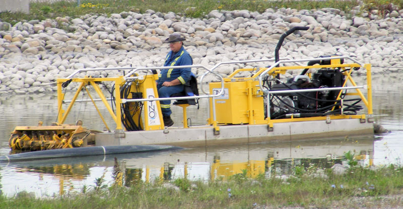 The successful technologist‒operator must be able to manage the many processes and equipment at water resource recovery facilities. This operator is dredging a lagoon. Photo courtesy of Seldon. 