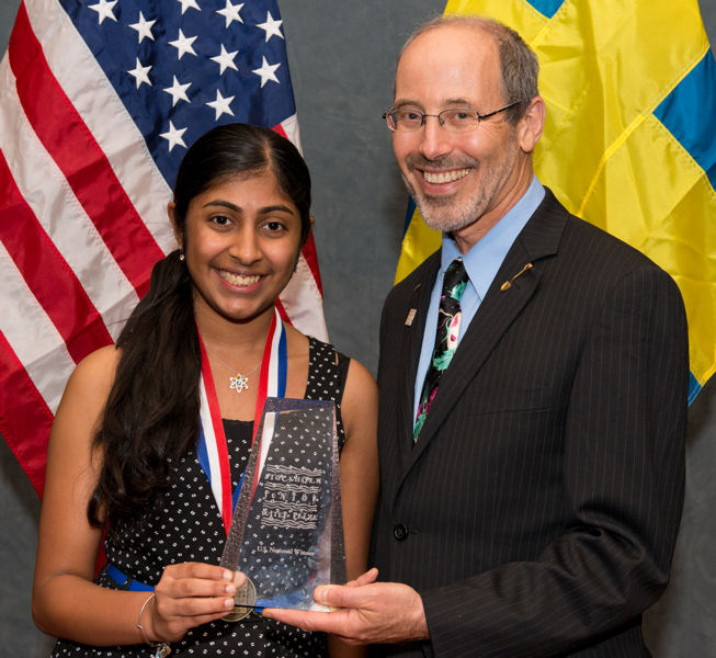  From left, the 2014 U.S. Stockholm Junior Water Prize (SJWP) winner, Deepika Kurup, stands with Water Environment Federation (Alexandria, Va.) President-Elect Ed McCormick. Photo courtesy of AOB Photo.