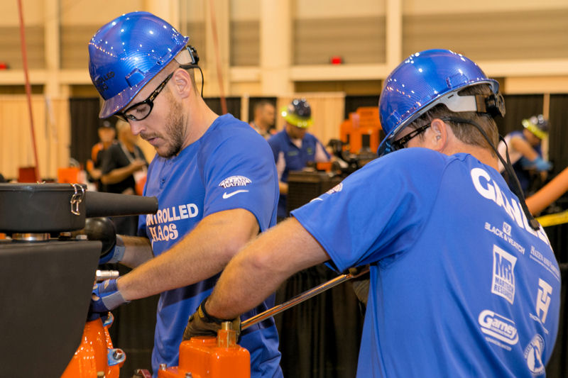 Patrick Ross and Kevin Ganley, members of South Carolina Water Environment Association team Controlled Chaos, compete during Operations Challenge 2014. Photo courtesy of Kieffer Photography.