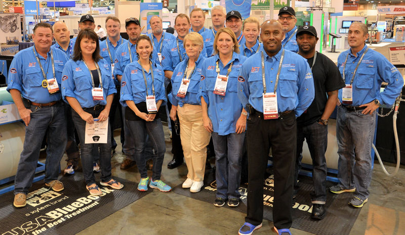 Perkins (front row, second from right) stands with all of the Collections Event judges who volunteered for Operations Challenge held at WEFTEC 2014. Photo courtesy of Perkins.