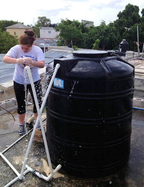 Nicole Abramson, one of the Virginia Tech research students, collected water samples from the town of Veron testing them for E. coli, total coliform, and nitrate. Photo courtesy of Tori Hamsher.