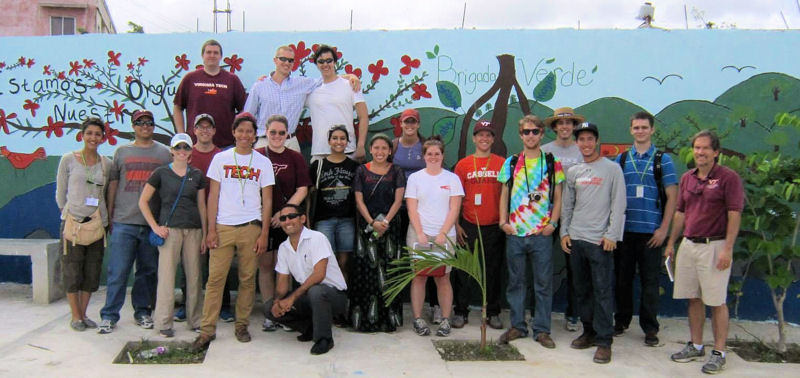 Graduate students also helped construct a vegetated submerged wetland system to help treat local wastewater. Students, from left back row, Dan Karalus, Ian Cunningham, Chris Sidney, from left front row, Sima Azarani, Carlos Mena Pena, Jaclyn Dixon, Aaron Mabee, Moises Bobadilla, Stephanie Liebau, Saloni Sood, Natalia Hoz De Vila, Tori Hamsher, Nicole Abramson, Ryan Slabach Brubaker, Robbie Grover, Sam Consolvo, Ross Abbott, and Mark Hamsher, stand with professor Mark Widdowson, and front, a Veron resident. Photo courtesy of Ben Hulefeld.