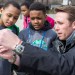 From right, Philippe Cousteau Jr. and students from the Anne Beers Elementary School in Washington, D.C., test water quality along the Anacostia River during an EarthEcho International (Washington, D.C.) 2015 World Water Monitoring Challenge event. Photo courtesy of EarthEcho International.