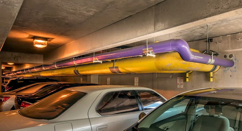 Some of the “purple pipe” distribution system that carries reclaimed water to be used as process water in three central chiller facilities and the campus steam facility as well as to flush toilets in residence halls. Photo courtesy of Fisher, Emory University.