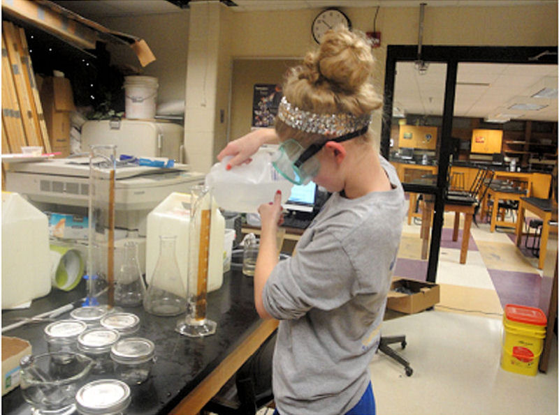Angela Moynan, two-time Minnesota SJWP winner, mixes serial dilutions of ibuprofen to assess pharmaceutical contamination in the St. Louis River. Photo courtesy of Welsh.