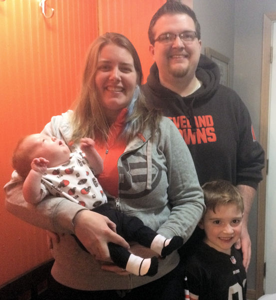 Wood competed at Operations Challenge when she was 7-months pregnant with approval from her doctor. She stands with her husband, son, and new daughter. Photo courtesy of Wood.