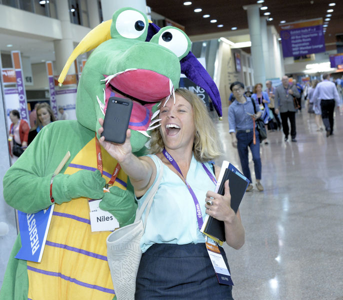 A WEFTEC 2016 attendee takes a selfie with Niles. Photo courtesy of Oscar &amp; Associates.