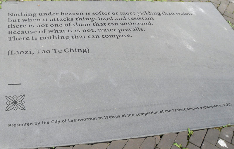 The inscription from a dedication plaque installed near rain gardens outside of Wetsus recognizes water’s ability to prevail. Photo courtesy of McDonnell.