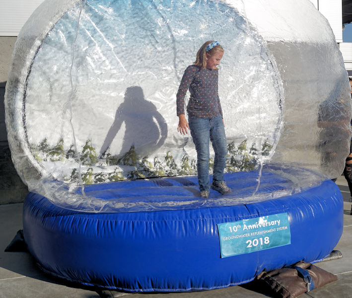 Winter Fest activities that catered to the younger visitors included snow slides and a human-sized, inflated snow globe. Photo courtesy of OCWD.