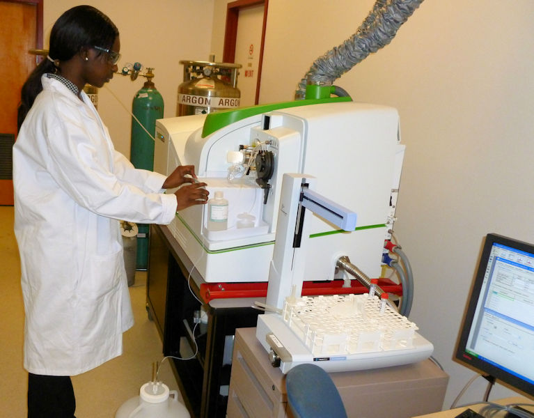 Omololu works with current laboratory technology in one of the university’s state-of-the-art facilities. Photo courtesy of Deksissa.