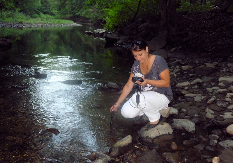 Ivelina Lambova takes measurements to determine water quality when the now graduate was a student of the University of the District of Columbia (UDC; Washington, D.C.) Water Resources Management Program. Photo courtesy of Tolessa Deksissa, director and coordinator of the UDC Water Resources Management Program.