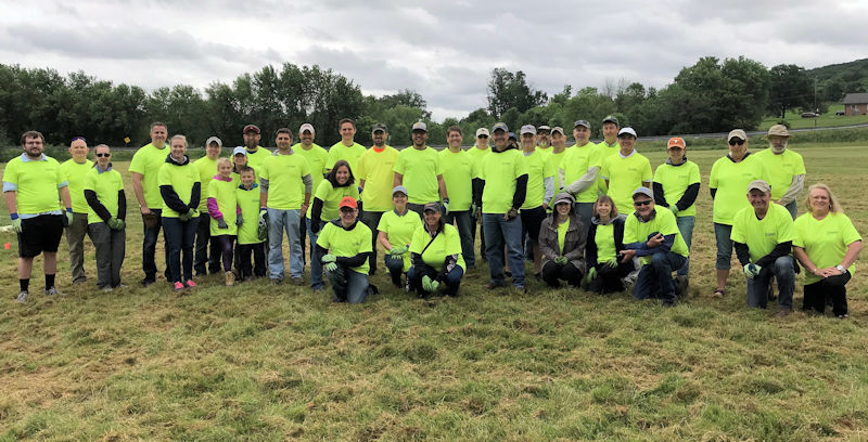 About 45 volunteers helped plant between 275 and 300 trees during PWEA’s PennTec Community Service Project. Photo courtesy of Boynton.