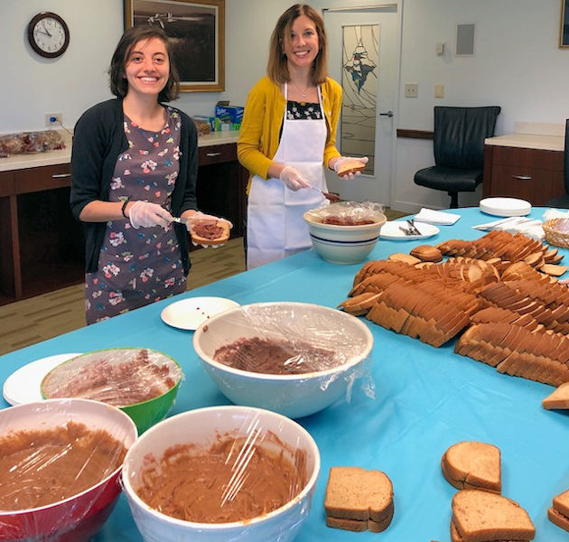 WEF staff including, from left, Saltzman and Kelsey Hurst, pitch in to make sandwiches to donate to the local community through Martha’s Table (Washington, D.C.). WEF photo/Camille Sanders. 