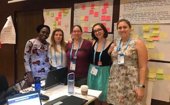 Jennifer Loudon, middle, works with her team to come up with a solution to providing clean water and sanitation to communities in need during the 2018 UNLEASH Innovation Lab. Photo courtesy of Loudon.