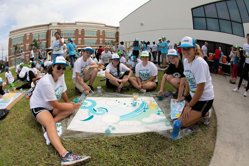 Volunteers at the 2018 Service Project also helped create a mural that educates about water. Photo courtesy of Natalie Keene Photography.